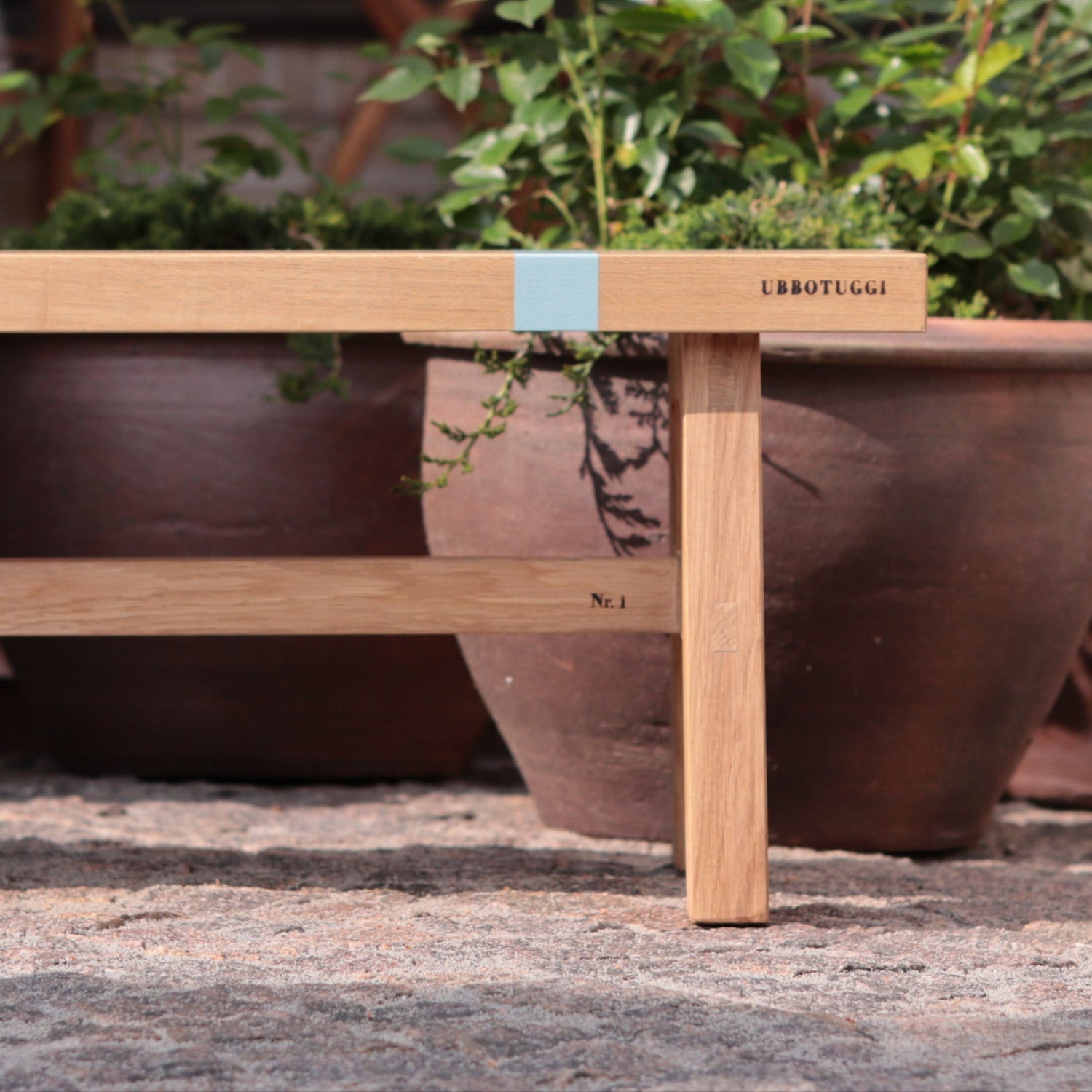 UBBOTUGGI MOMENTUMAIRE OAK BENCH Identity. Production number, burned.