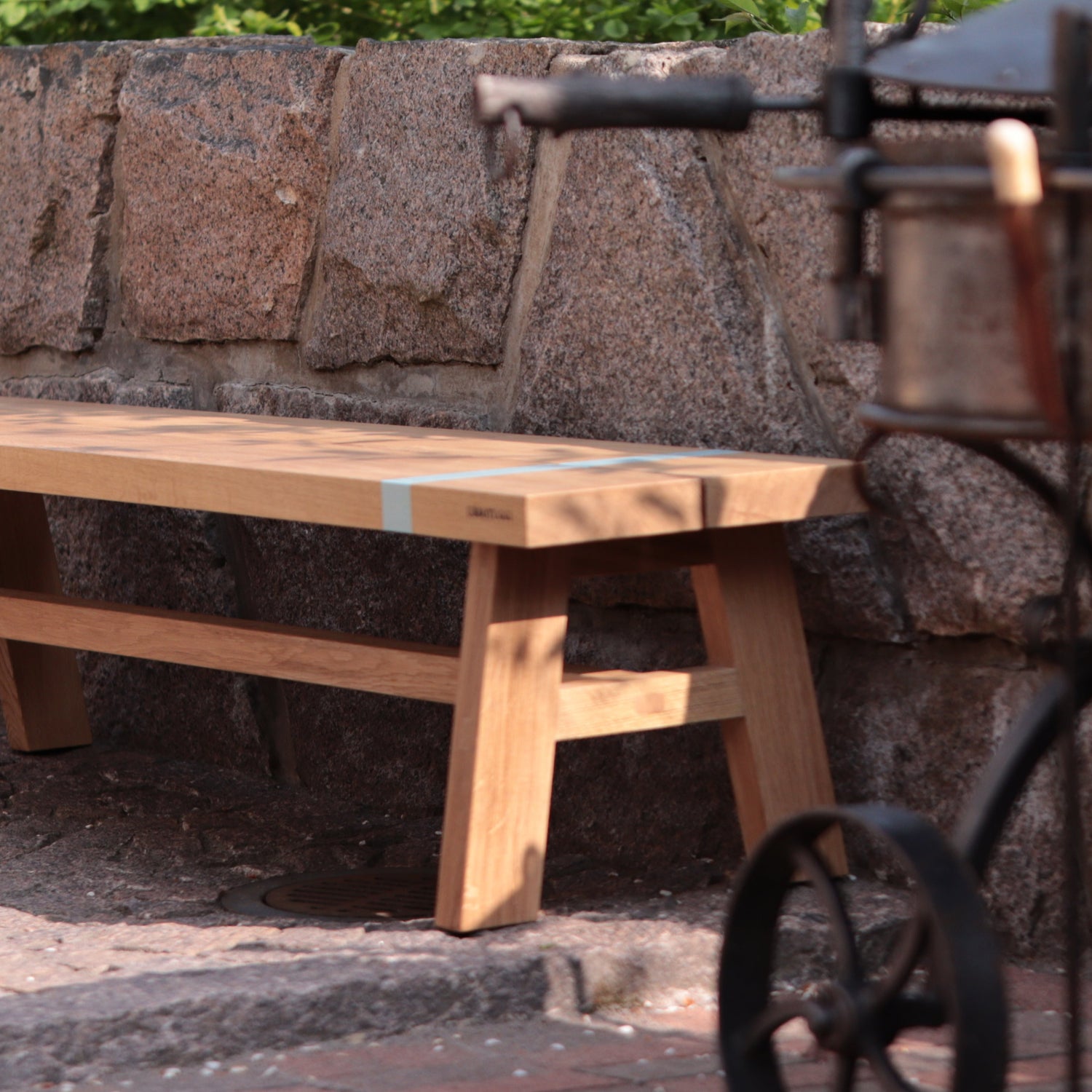 UBBOTUGGI MOMENTUMAIRE OAK BENCH A secret message, burned into wood.